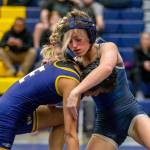 Arlington’s Araxi Crew wrestles during a wrestling scramble at Everett High School on Wednesday, Dec. 13, 2023 in Everett, Washington. (Olivia Vanni / The Herald)