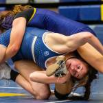Arlington’s Danielle Crew wrestles during a wrestling scramble at Everett High School on Wednesday, Dec. 13, 2023 in Everett, Washington. (Olivia Vanni / The Herald)