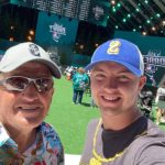 Former longtime Everett Community College mens basketball coach Larry Walker and grandson Ethan Martin during MLB All-Star weekend in Seattle. (Photo courtesy of Larry Walker)