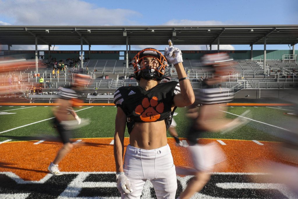 Sophomore wide receiver and free safety Gino Howard poses for a portrait between drills at Granite Falls High School on Wednesday, Oct. 11, 2023. (Annie Barker / The Herald)