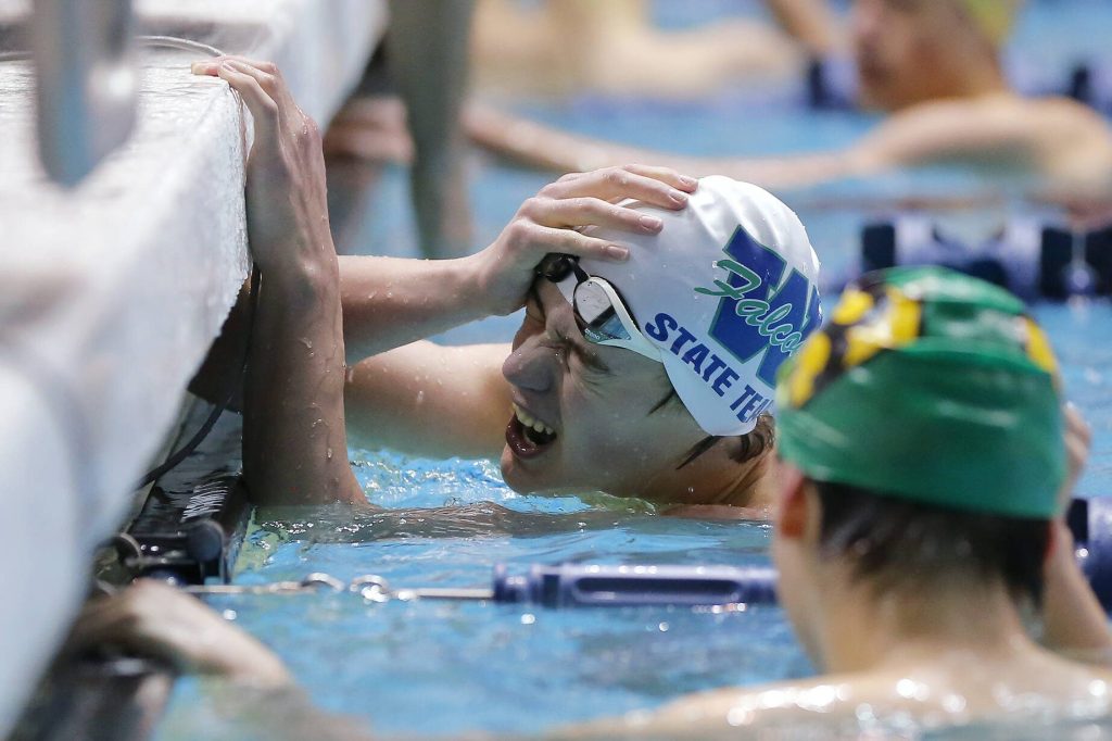 Woodinville senior Levi Major shouts about missing a time by .01 seconds after finishing the 100 yard freestyle consolation race at the 4A WIAA Boys High School Swim and Dive Championships on Friday, Feb. 18, 2023, at the Weyerhaeuser King County Aquatic Center in Federal Way, Washington. (Ryan Berry / The Herald)