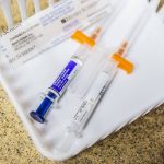 A COVID-19 and influenza vaccine on Thursday, Sept. 28, 2023 in Everett, Washington. (Olivia Vanni / The Herald)