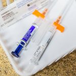 A COVID-19 and influenza vaccine on Thursday, Sept. 28, 2023 in Everett, Washington. (Olivia Vanni / The Herald)