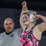 Marysville Pilchucks Alivia White celebrates winning the 3A/4A girls 190-pound championship match during Mat Classic XXXIV at the Tacoma Dome in Tacoma on Feb. 18, 2023. (Annie Barker / The Herald)