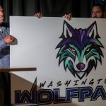 The Washington Wolfpack logo is revealed at Tony Vs Garage on Oct. 26, 2023, in Everett. (Annie Barker / The Herald)