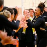 Lynnwoods Hannah Johnson high-fives teammates before a match against Jackson on Sept. 14 at Lynnwood High School in Bothell. (Ryan Berry / The Herald)