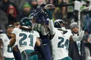 Seattle Seahawks wide receiver DK Metcalf (14) catches the ball during an NFL football game against the Philadelphia Eagles, Monday, December 18, 2023 in Seattle. The Seahawks won 20-17. (AP Photo/Ben VanHouten)