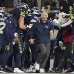 Seattle Seahawks head coach Pete Carroll reacts as players gather during the second half of an NFL football game against the Philadelphia Eagles, Monday, Dec. 18, 2023, in Seattle. The Seahawks won 20-17. (AP Photo/Lindsey Wasson)