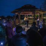 Nurses and community members gather at Drew Nielsen Neighborhood Park while Valerie Whorton, RN, BSN, speaks about the need for safer staffing standards in light of increasing patient loads at Providence on Saturday, Feb. 25, 2023 in Everett, Washington. (Olivia Vanni / The Herald)