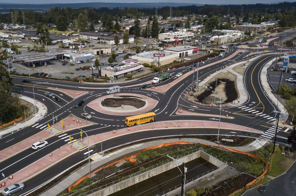 Traffic moves around one of Lake Stevens new roundabouts at the intersection of Highway 204 and Highway 9 on Wednesday, Aug. 23, 2023, in Lake Stevens, Washington. (Olivia Vanni / The Herald)