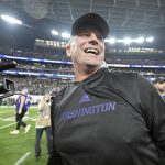 Washington coach Kalen DeBoer smiles after the teams victory over Oregon in the Pac-12 championship NCAA college football game on Dec. 1 in Las Vegas. DeBoer has made a rapid rise through the coaching ranks. He won three NAIA national championships as head coach at the University of Sioux Falls from 2005-09 and had five coaching stops in 12 years before landing at Washington. (Associated Press)