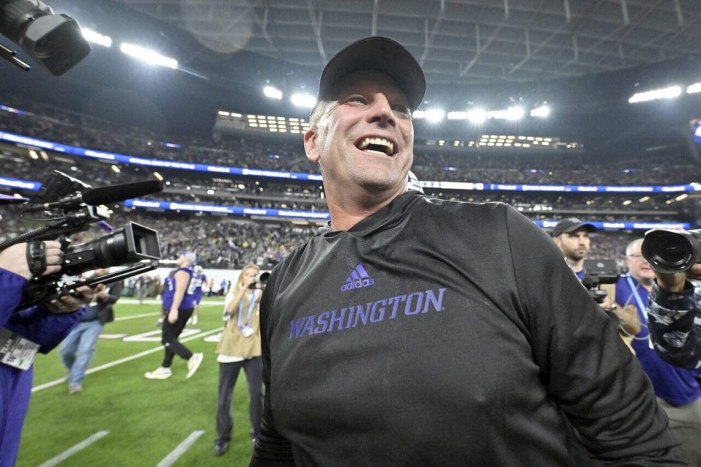 Washington coach Kalen DeBoer smiles after the teams victory over Oregon in the Pac-12 championship NCAA college football game on Dec. 1 in Las Vegas. DeBoer has made a rapid rise through the coaching ranks. He won three NAIA national championships as head coach at the University of Sioux Falls from 2005-09 and had five coaching stops in 12 years before landing at Washington. (Associated Press)