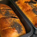 Poppy seed roll loaves rest after being taken out of the oven at European Deli Svitlana. (Ryan Berry / The Herald)