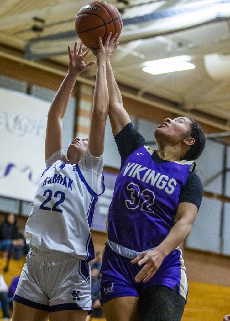 Lake Stevens Keira Tupua blocks a shot by Kamiaks Addy Baker during the game on Wednesday, Jan. 3, 2024 in Mukilteo, Washington. (Olivia Vanni / The Herald)