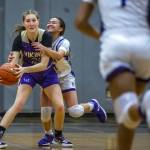 Kamaiks Bella Hasan fouls Lake Stevens Kamryn Wenz in the final seconds of the game on Wednesday, Jan. 3, 2024 in Mukilteo, Washington. (Olivia Vanni / The Herald)