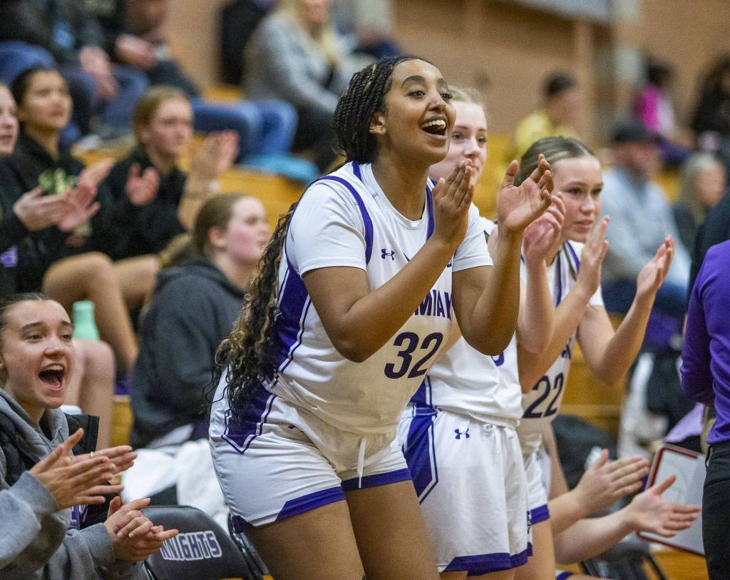 Kamiaks Beza Kagnew cheers on her teammates during the game against Lake Stevens on Wednesday, Jan. 3, 2024 in Mukilteo, Washington. (Olivia Vanni / The Herald)