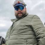 Daniel Scott (center, in green jacket) is shown in a video before the Proud Boys and other rioters stormed the U.S. Capitol building on Jan. 6, 2021, in Washington, D.C. (U.S. Attorneys Office for the District of Columbia)