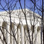 The U.S Supreme Court is photographed on Friday, Jan. 5, 2024, in Washington. The Supreme Court will decide whether former President Donald Trump can be kept off the 2024 presidential ballot because of his efforts to overturn his 2020 election loss that culminated in the U.S. Capitol attack. The justices Friday agreed to take a Colorado case, inserting themselves in the presidential campaign and acknowledging the need to decide quickly. (AP Photo/Mariam Zuhaib)