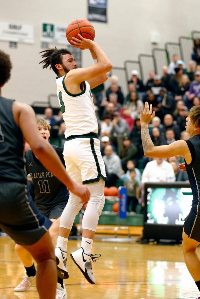 Jackson guard Trey Hawkins shoots a jumper against Glacier Peak on Wednesday, Jan. 10, 2024, at Henry M. Jackson High School in Mill Creek, Washington. (Ryan Berry / The Herald)