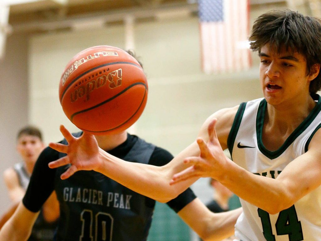 Jacksons Joseph Eichhorn goes after a rebound against Glacier Peak on Wednesday, Jan. 10, 2024, at Henry M. Jackson High School in Mill Creek, Washington. (Ryan Berry / The Herald)