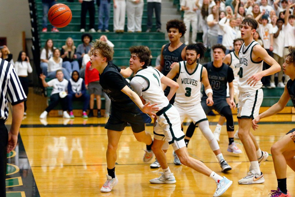 Glacier Peaks Reed Nagel watches the ball go out of bounds against Jackson on Wednesday, Jan. 10, 2024, at Henry M. Jackson High School in Mill Creek, Washington. (Ryan Berry / The Herald)