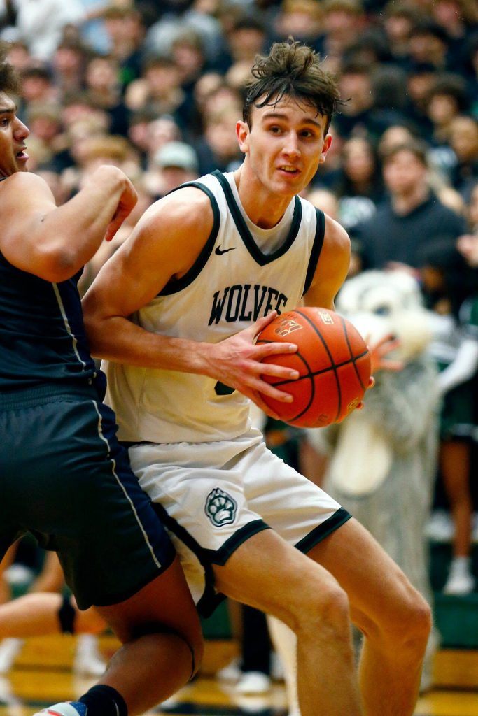 Jacksons Ryan Mcferran works in the post against Glacier Peak on Wednesday, Jan. 10, 2024, at Henry M. Jackson High School in Mill Creek, Washington. (Ryan Berry / The Herald)