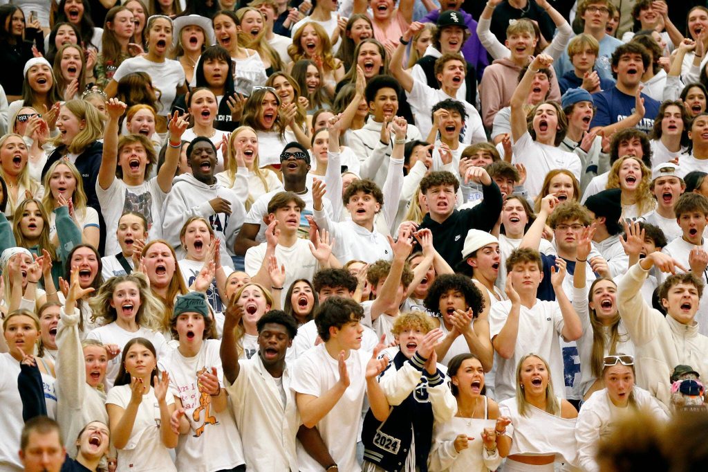 Glacier Peaks student section goes wild as their team closes in on Jackson on Wednesday at Henry M. Jackson High School in Mill Creek. (Ryan Berry / The Herald)