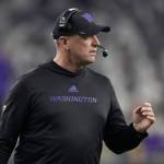 Washington head coach Kalen DeBoer watches during the first half of the national championship NCAA College Football Playoff game against Michigan Monday, Jan. 8, 2024, in Houston. (AP Photo/Eric Gay)