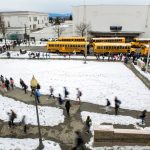 Students exit Everett High School on Thursday, Feb. 14, 2019 after the first day of school since Feb. 8 due to weather cancellations. (Olivia Vanni / The Herald)