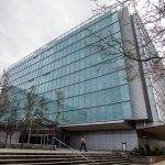 A person walks out of the Snohomish County Corrections building on Wednesday, Jan. 3, 2024 in Everett, Washington. (Olivia Vanni / The Herald)