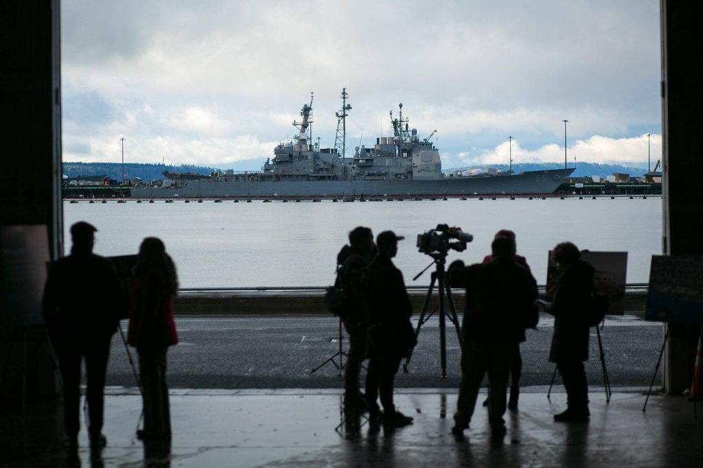 Naval Station Everett is seen across the water from a press conference at the Port of Everett Seaport on Wednesday, Jan. 17, 2024, in Everett, Washington. (Ryan Berry / The Herald)