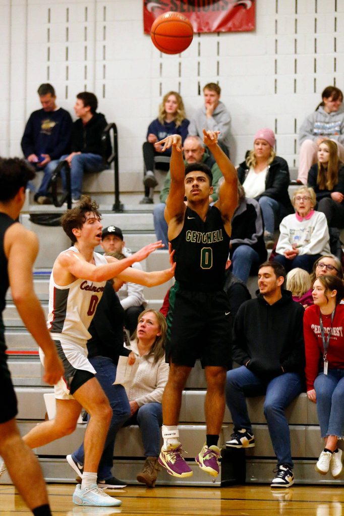 Marysville Getchells Mekai Williams shoots a three against Cedarcrest on Tuesday, Jan. 16, 2024, at Cedarcrest High School in Duvall, Washington. (Ryan Berry / The Herald)