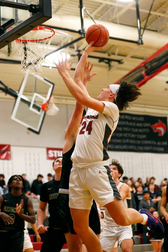Cedarcrests Murphy Vliem puts up a shot against Marysville Getchell on Tuesday, Jan. 16, 2024, at Cedarcrest High School in Duvall, Washington. (Ryan Berry / The Herald)