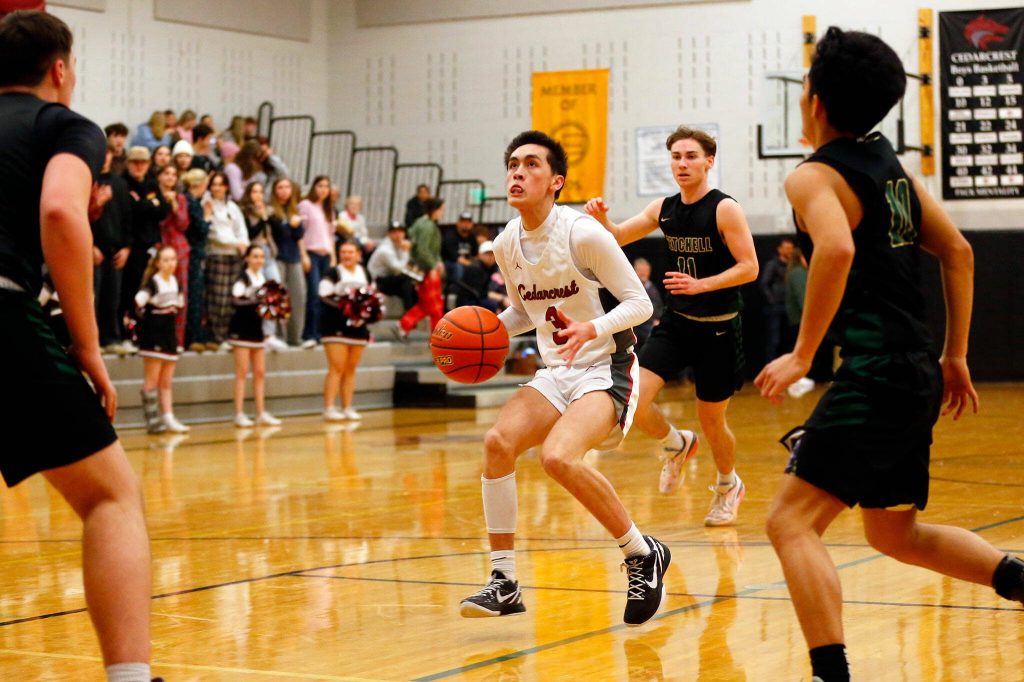 Cedarcrests Adam Rawlings stops to shoot an open floater in the lane against Marysville Getchell on Tuesday, Jan. 16, 2024, at Cedarcrest High School in Duvall, Washington. (Ryan Berry / The Herald)