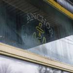 An Anchor Pub neon sign is visible in the window on Thursday, Jan. 18, 2024 in Everett, Washington. (Olivia Vanni / The Herald)