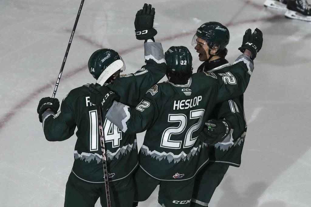 Silvertips players celebrate during a game between against the Tri-City Americans on Sunday at the Angel of the Winds Arena in Everett. (Annie Barker / The Herald)