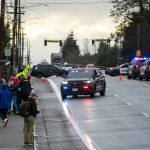 Police block off West Casino Road during a standoff following a shooting at The Bluffs Apartments on Monday, Jan. 22, 2024, in Everett, Washington. (Ryan Berry / The Herald)