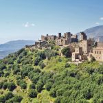 In a far-off corner of the Peloponnese, clan wars left the hill town of Vathia in ruins. (Rick Steves / Rick Steves' Europe)