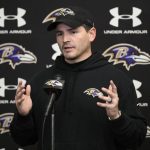 Baltimore Ravens defensive coordinator Mike Macdonald talks to the media on Jan. 25 in Owings Mills, Md. Macdonald and Detroit offensive coordinator Ben Johnson have been linked to Seattles open head coaching position. (AP Photo/Nick Wass)