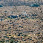 Emergency responders surround the wreckage of an airplane that crashed into a field along U.S. 2 just east of Snohomish on Friday, Nov. 18, 2022, in Snohomish, Washington. (Ryan Berry / The Herald)