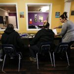 Ian Terry / The Herald

Cocoon House advocate Morgan Huber (right) talks with teens gathered at the nonprofit's U-Turn drop-in center on Broadway in Everett on Tuesday, Dec. 13.

Photo taken on 12132016