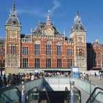 Amsterdam Centraal train station is the starting point for any Amsterdam adventure: history, famous art, or mayonnaise-slathered fries. (Rick Steves Europe)