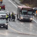 Fleeing people board an Everett Transit bus on Wednesday, Jan. 31, 2024 in Everett, Washington. (Olivia Vanni / The Herald)
