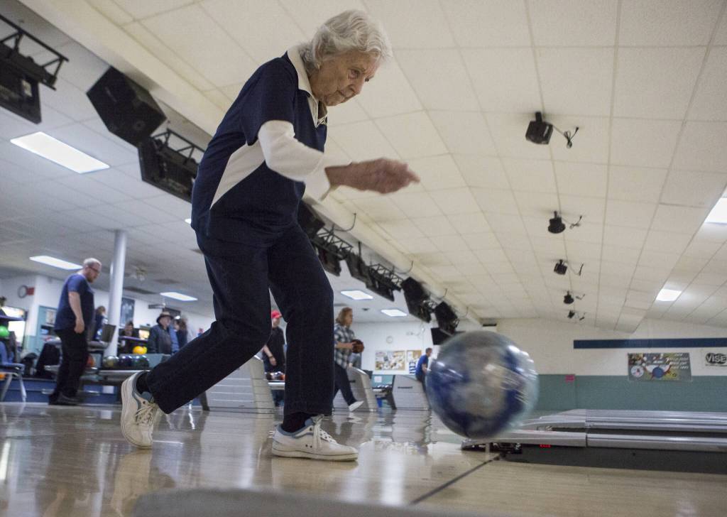 Carol Perry lines bowls during league bowling at Strawberry Lanes on Wednesday, Feb. 26, 2020 in Marysville , Wa. (Olivia Vanni / The Herald)