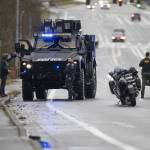 A SWAT vehicle drives along 112th Street SW on Wednesday, Jan. 31, 2024 in Everett, Washington. (Olivia Vanni / The Herald)