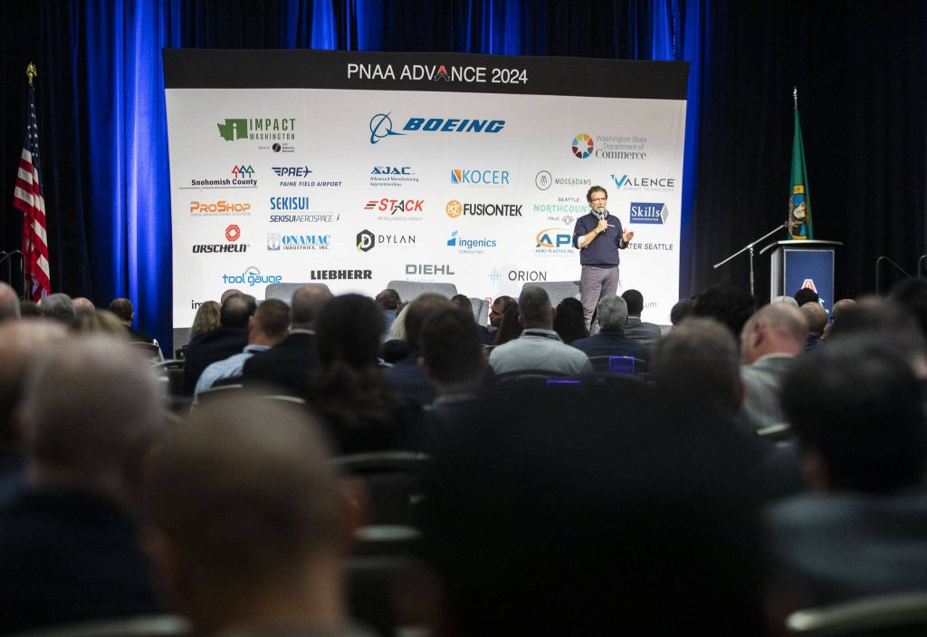 Ihssane Mounir, senior vice president of Global Supply Chain for Boeing, speaks at the Pacific Northwest Aerospace Conference on Wednesday, Feb. 7, 2024 in Lynnwood, Washington. (Olivia Vanni / The Herald)