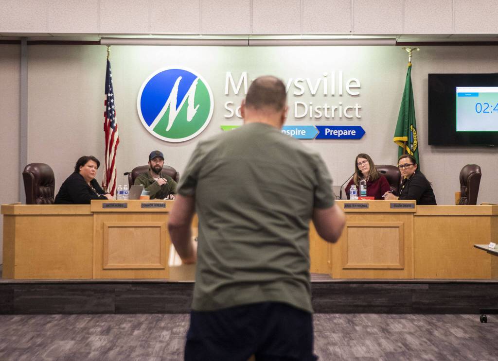 Marysville School Board members listen to public comment during a board meeting on Monday, Feb. 5, 2024 in Marysville, Washington. (Olivia Vanni / The Herald)