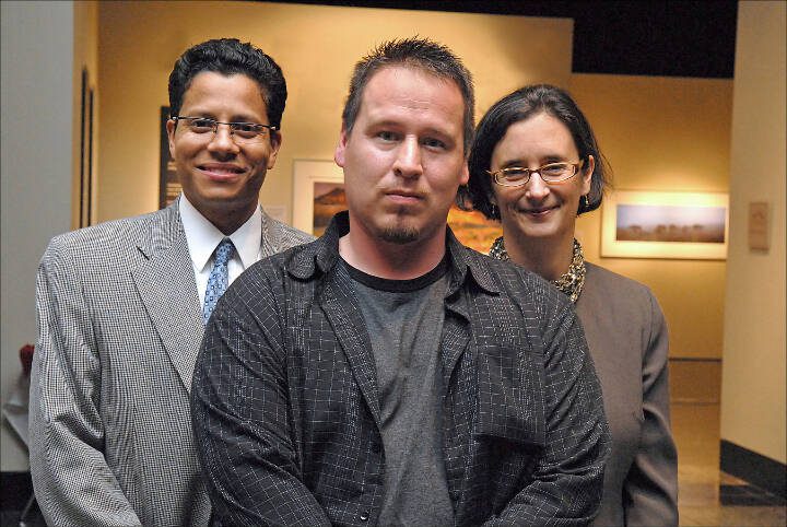 Ted Bradford, center, poses for a photo with Felix Luna, left, of Peterson Wampold Rosato Feldman Luna, the civil attorneys whose investigation uncovered a DNA match for the 1995 rape case in which Ted Bradford was wrongly convicted, and Jackie McMurtrie, founder of Innocence Project Northwest, the organization whose work led to Bradfords exoneration. (Business Wire)