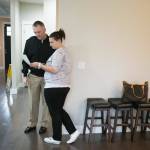 As a home inspector looks over a house they intend to buy, Heather and Tyler Ferrel look over paperwork about the house on Wednesday, Nov. 28, 2018 in Marysville, Wa. (Andy Bronson / The Herald file)