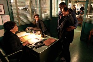 "Law & Order" cast members (from left) S. Epatha Merkerson, Jeremy Sisto and Anthony Anderson are shown with episode director Marisol Torres on the show's set in New York, in April 2008. (Bernadette Tuazon / Associated Press file photo)